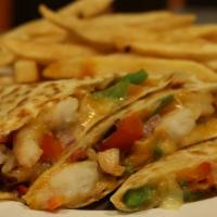 Shrimp Quesadilla · Grilled Shrimp with peppers, onions, and cheddar cheese served with sour cream

