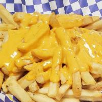 Cheese Fries · Golden crisp French fries topped with liquid cheese.
