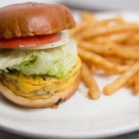 All American Burger · Our juicy 1/2 lb. Angus burger served with American cheese, lettuce, tomato, and onion.