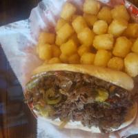 Philly Cheese Steak · Seasoned sliced ribeye steak or sliced grilled chicken, green and red peppers, caramelized o...