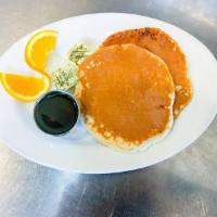 The Empire Pancakes · 3 golden buttermilk pancakes served with butter and syrup.