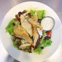 Nutty Cranberry Salad · Mixed greens, craisins, candied walnuts, tomatoes, grilled chicken and blue cheese crumbs.