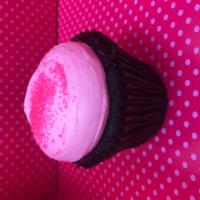 Pink Chocolate Cupcake · Chocolate cake with our signature pink buttercream frosting