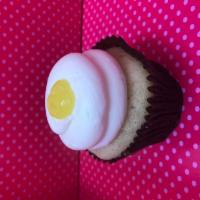 Lemon Cupcake · Vanilla cake filled with lemon, topped with our lemon buttercream, and a dollop of our lemon...