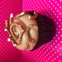Caramel Crunch Cupcake · Vanilla or chocolate cake with caramel swirl frosting, sea salt, and pretzels (please specif...