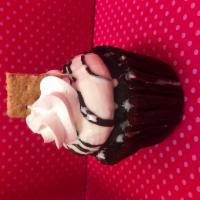 Smore's Cupcake · Chocolate cake filled with marshmallow cream and vanilla buttercream frosting with whipped c...