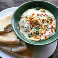 Hummus Tahini · Ground chickpeas with tahini sauce.