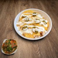 Nancho Bowl · Shredded Chicken, Rice, Beans, Nacho Cheese, Shredded Cheese, Jalapenos, Sour Cream & Salsa