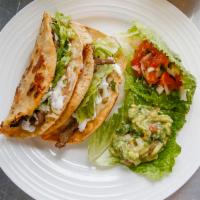 Real Quesadilla · Grilled corn tortilla, cheese and choice of meat.