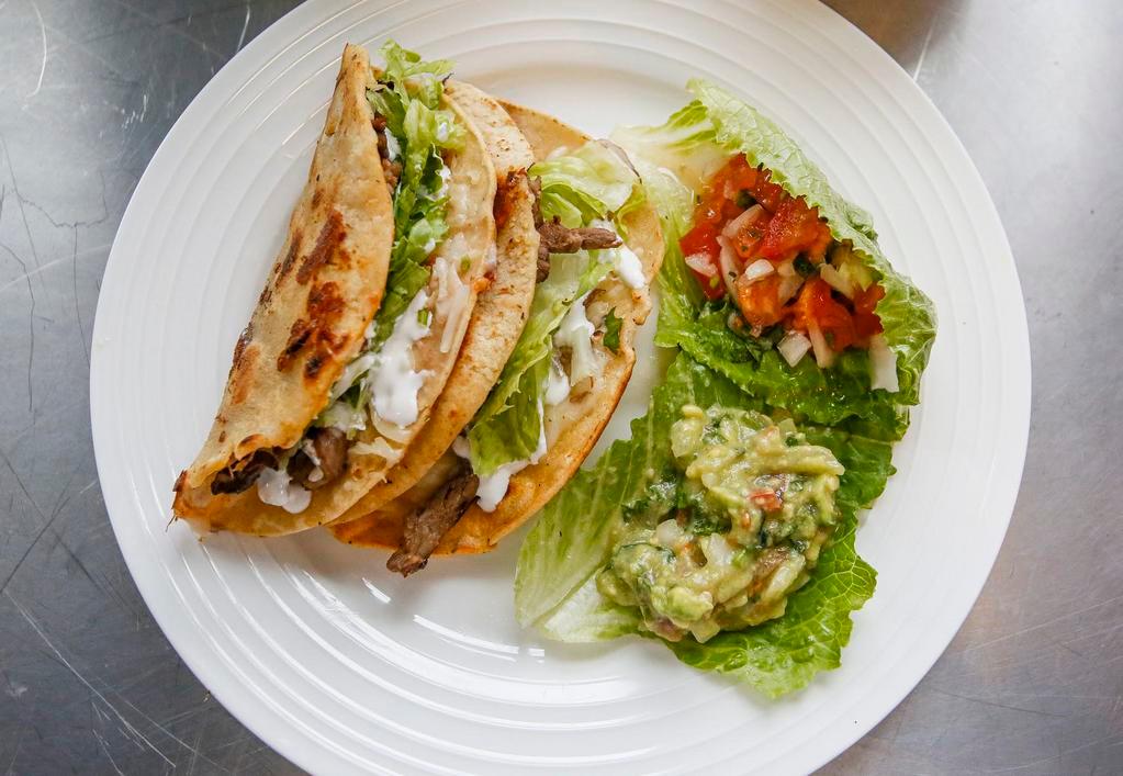 Real Quesadilla · Grilled corn tortilla, cheese and choice of meat.