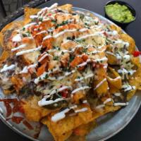 Chicken Nachos for Two · tomatoes, red onion, black beans, cilantro, chihuahua and nacho cheese, sour cream, jalapeño...