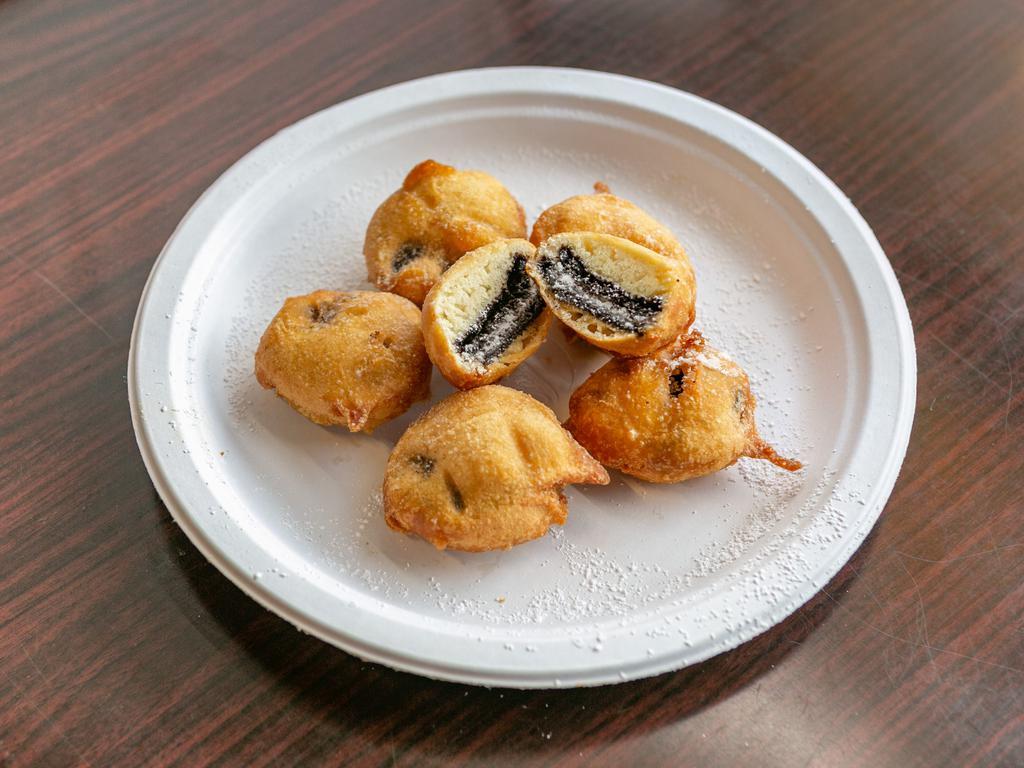 Fried Oreos · 5 pieces topped with powdered sugar.