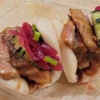 Pork Belly Bao Bun · Stuffed with pickled onion, cucumber and scallion.