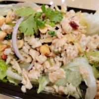 Namsod Salad · Ground chicken with fresh ginger, red onion, scallion, cilantro, peanuts and lime juice on a...
