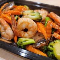 Teriyaki Sauce · Stir-fried with house teriyaki sauce. Served with broccoli, mushroom and carrot.