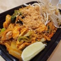 Pad Thai · Rice noodle sauteed with egg, scallion and bean sprouts. Topped with ground peanuts. Add ext...