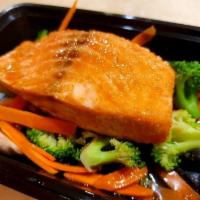 Salmon Teriyaki · Grilled salmon with house teriyaki sauce on top of fresh mixed vegetables.