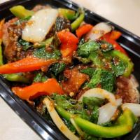 Duck Basil · Crispy duck sauteed with fresh basil, onion and bell pepper. Served on top of mixed vegetabl...