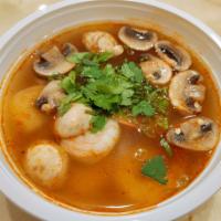 Tom Yum Ramen · Thai lemongrass and lime juice soup with Japanese ramen noodle, mushroom, scallion and cilan...