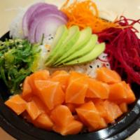 Poke Don · Tuna or salmon on top of sushi rice with avocado, red onion, seaweed salad, carrot, daikon, ...