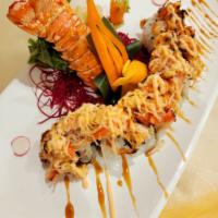 Lobster Lava Roll · Lobster, avocado, cucumber, scallion, spicy mayo topped with masago and lobster dynamite. Se...