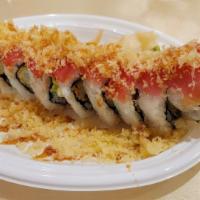 Rice and Roll · Shrimp tempura, avocado, cucumber, cream cheese, sesame seeds and scallion. Topped with tuna...