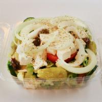 Greek Salad · Feta cheese, kalamata olives, pepperoncini, oregano and onions.