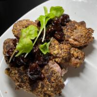 Pork Tenderloin · walnut crusted, dried cherry whiskey jam,
peruvian purple potatoes