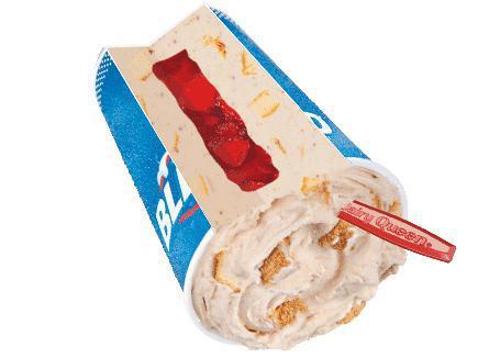Royal New York Cheesecake Blizzard® Treat · Cheesecake pieces and graham blended with creamy vanilla soft serve then filled with a perfectly paired strawberry center.