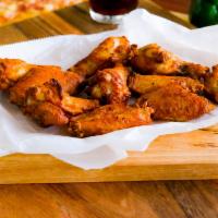 6 Chicken Wings · Cooked wing of a chicken coated in sauce or seasoning.