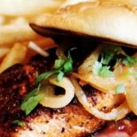 Luda’s Salmon Burger · Our amazing hand-cut 8oz  cajun seasoned grilled salmon fillet with grilled sweet onions, le...