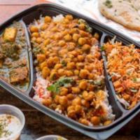 Channa Masala · Chickpeas with a blend of spices, onions, chilies and tomatoes.