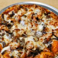 Shawarma Mix Pizza · A mix of beef and chicken shawarma. Extras for an additional charge.