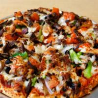 Combo Pizza · Beef and chicken shawarma, tomato, green pepper, red onion, mushroom, olive. Extra cheese fo...