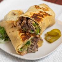 Beef Shawarma Sandwich · Thinly sliced roasted meat sandwich. 