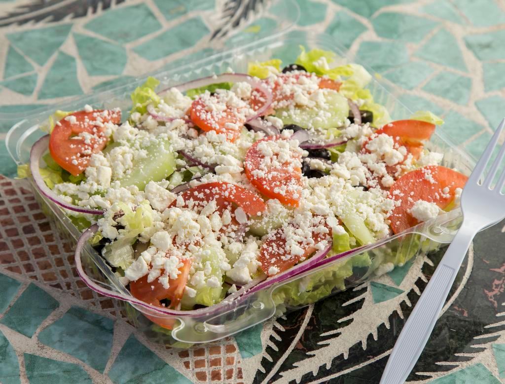 Greek Salad · Romaine, lettuce, tomatoes, red onions, cucumbers, black olives, yellow pepper, feta cheese and our famous Greek dressing.