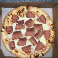 Florentine Pizza · No sauce, fresh tomato slices, prosciutto, mozzarella and Romano cheeses, olive oil and oreg...