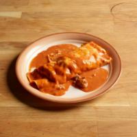 All Meat Burrito · Flour tortilla, filled with ground beef and topped with our delicious gravy and melted cheese.