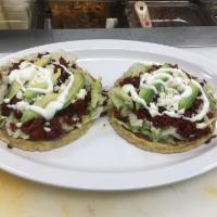 Sopes · Served with choice of meat, lettuce, cheese, pico, and sour cream. Carne, lechuga, queso, pi...