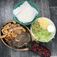 Fajitas with Shrimp · Onions, bell peppers, guacamole, sour cream, and cheese. Bistec o pollo, cebollas, chile mor...