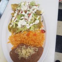 Enchiladas · Green sauce, chicken, lettuce, pico, cheese, sour cream, beans, and nice. Rojo o verde, poll...