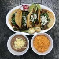 Orden de Tacos · 4 tacos with choice of meat, rice, and beans. 4 tacos con seleccion de carne, arroz, y frijo...