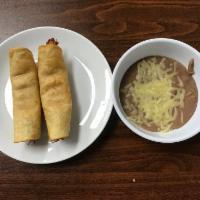 Flautas · Corn Tortilla rolled with chicken and fried