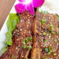 Hawaiian Pulehu Beef Short Ribs (3) aka Kalbi · Served with jasmine rice | cucumber kimchi