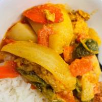 Chicken Curry · Chicken curry served with white rice or french bread.