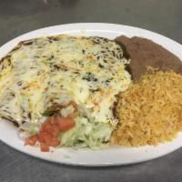 Enchiladas Dinner Special · Three corn tortillas dipped in our homemade enchilada sauce, stuffed with your choice of fil...