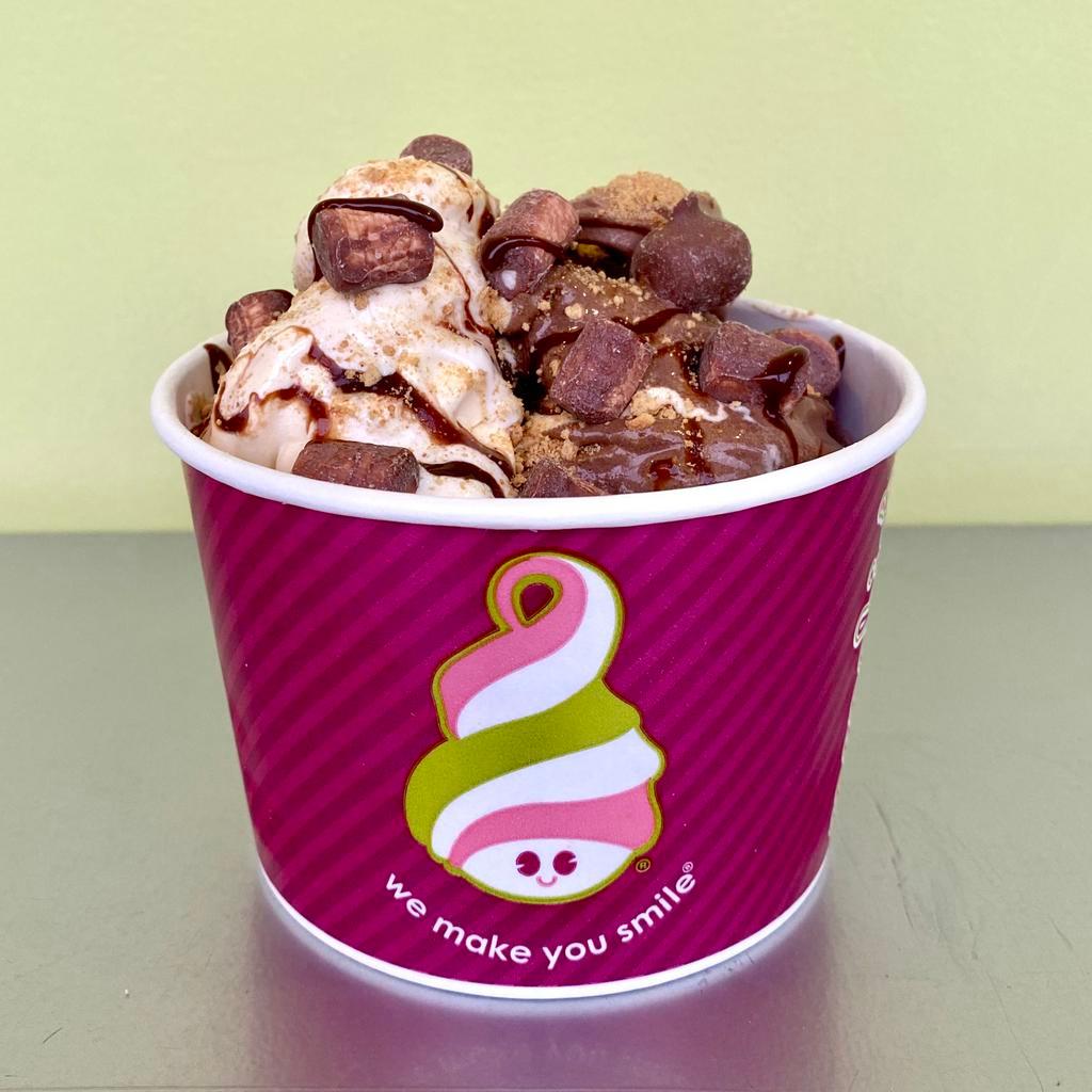 Campfire S'mores · Our scrumptious toasted Marshmallow &  Chocolate froyo topped with graham cracker crumbs, chocolate marshmallows, & marshmallow & fudge sauce.
