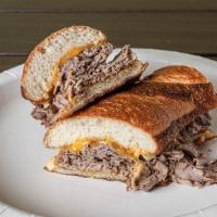 Cheddar Roast Beef Sub Combo · Roast beef under cheddar cheese with grilled onions and cherry pepper aioli on wheat baguett...
