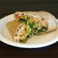 Buffalo Chicken Wrap · Chicken under blue cheese with Buffalo sauce, ranch, celery, romaine lettuce and tomatoes on...