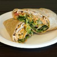 Buffalo Chicken Wrap Combo · Chicken under blue cheese with Buffalo sauce, ranch, celery, romaine lettuce and tomatoes on...